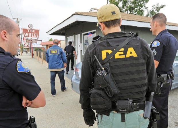 DEA with local police