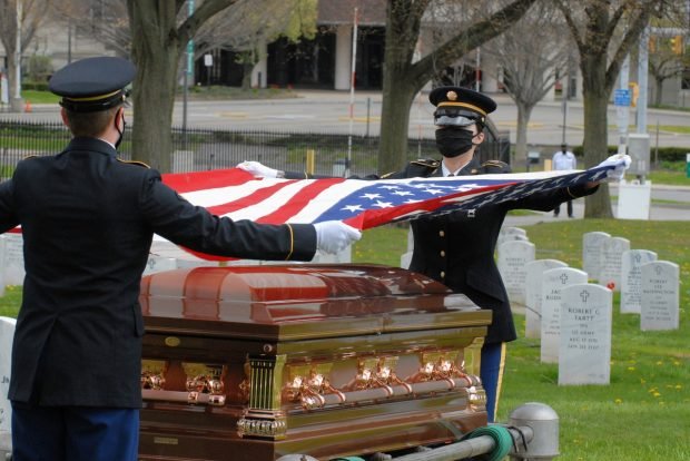 Honor guard soldiers at a military funeral.