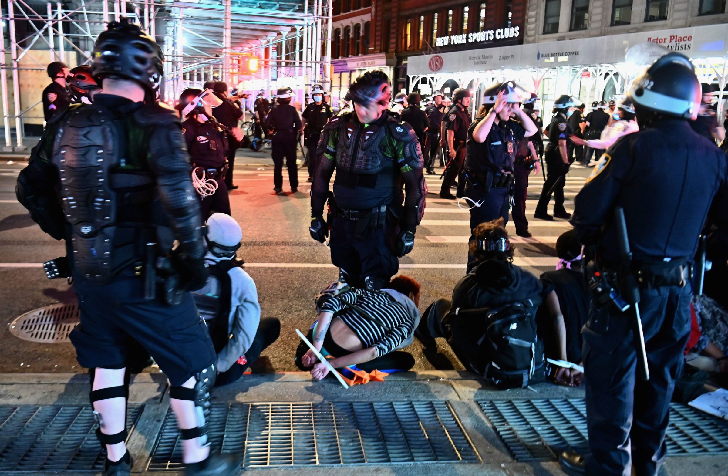 People are arrested after looting on June 2, 2020 in New York City. - Anti-racism protests have put several US cities under curfew to suppress rioting, following the death of George Floyd while in police custody. (ANGELA WEISS/AFP via Getty Images)