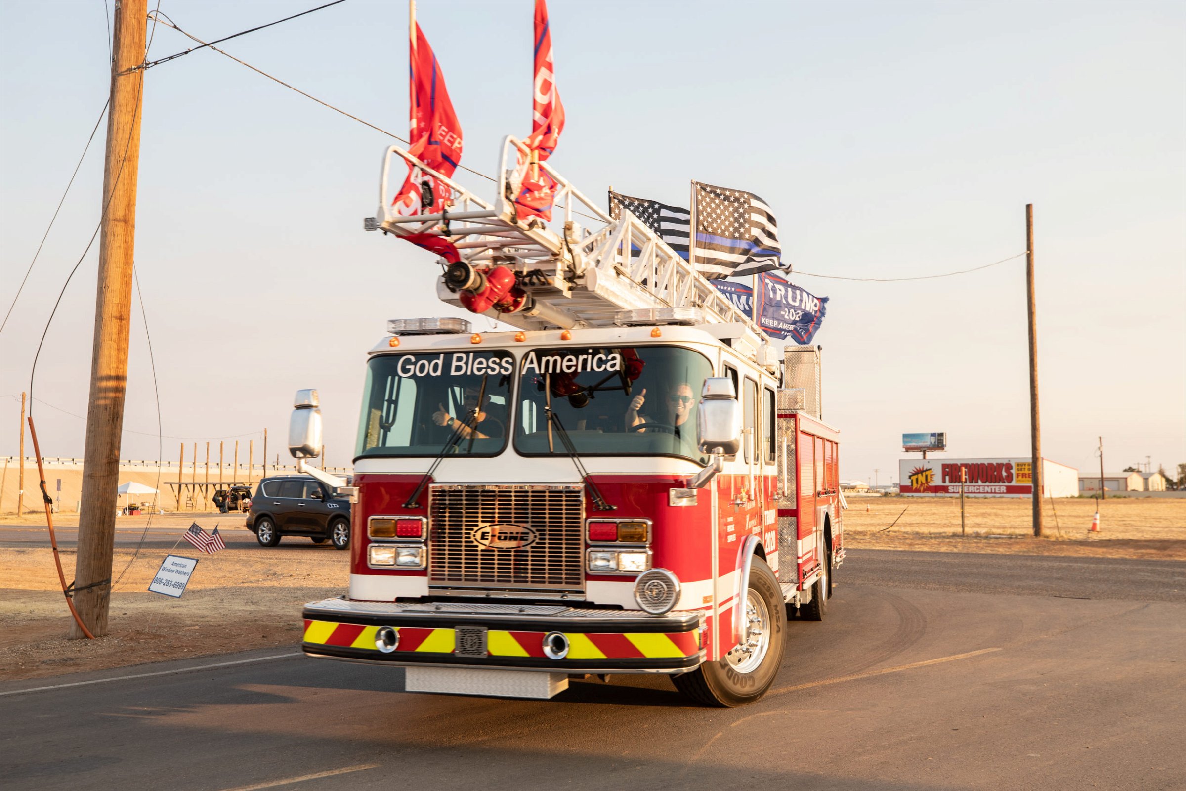 A fire truck returns to Cook's Garage from a "Trump Train" car parade in Lubbock, Texas, on Sunday, Oct. 18, 2020. (Kaylee Greenlee - DCNF)