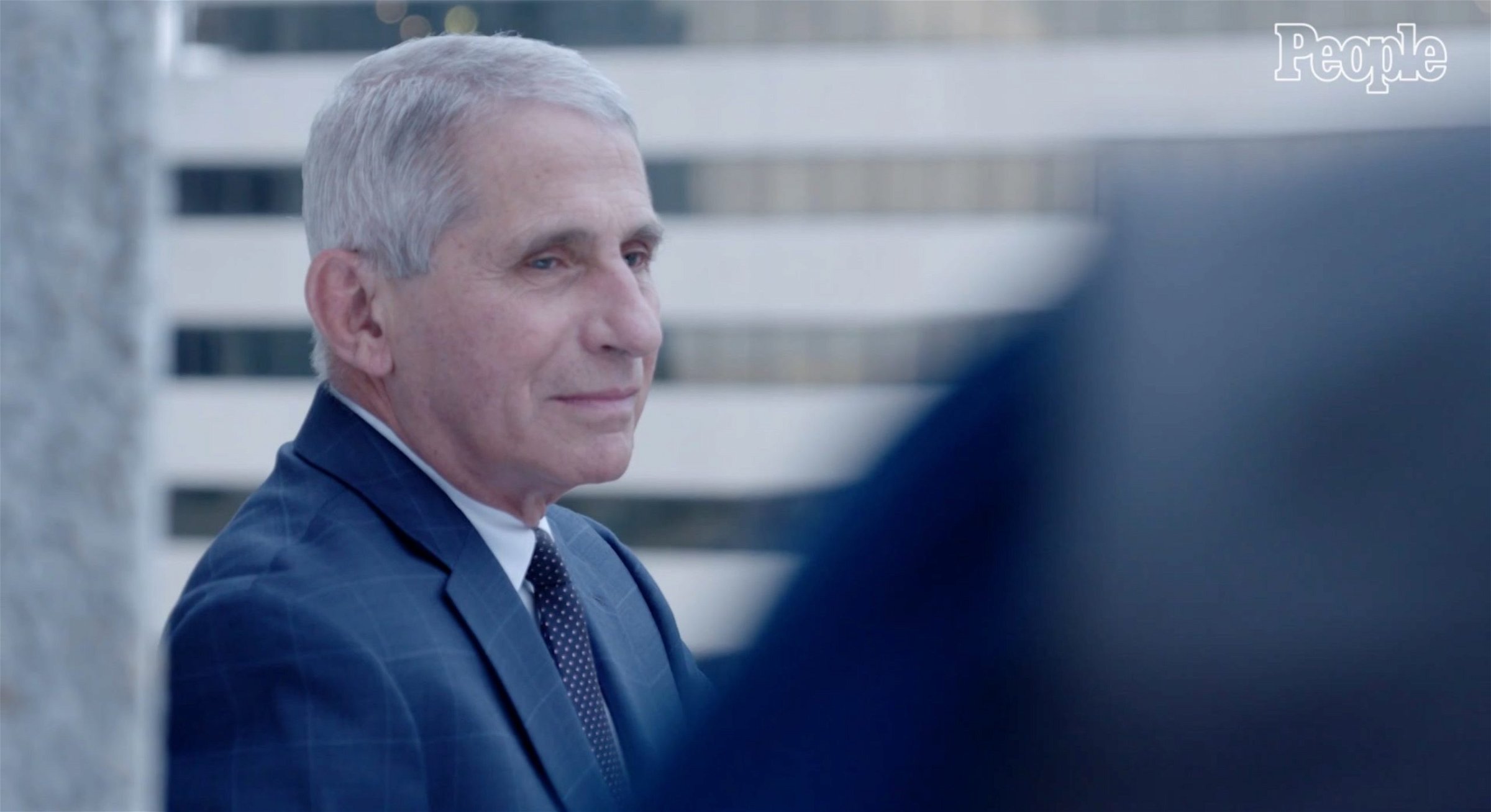 Dr. Anthony Fauci poses for a photo with People magazine after being selected as one of the magazine's "2020 People of the Year." (People magazine/Video screenshot)
