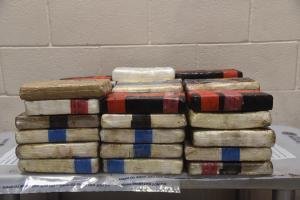 Packages containing 113 pounds of cocaine discovered by CBP officers within a tractor trailer at World Trade Bridge.