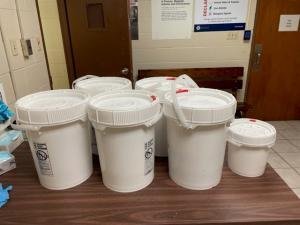 Buckets containing nearly 175 pounds of liquid methamphetamine seized by CBP officers at Progreso International Bridge.