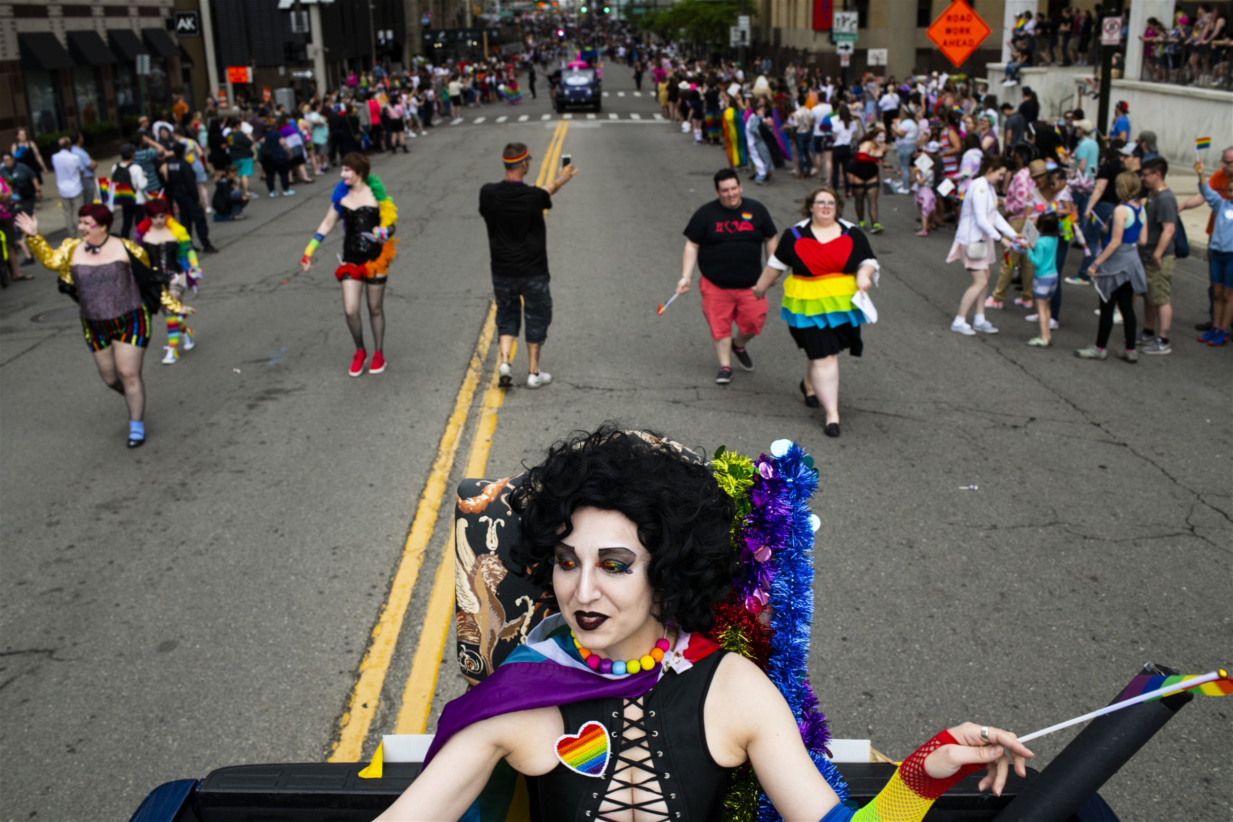 Playing Frankenfurter from "The Rocky Horror Picture Show," Lauren Montgomery, 34, rides in a truck making its way through the procession during the Motor City Pride Parade on June 9, 2019 in Detroit, Michigan. (Photo by Brittany Greeson/Getty Images)